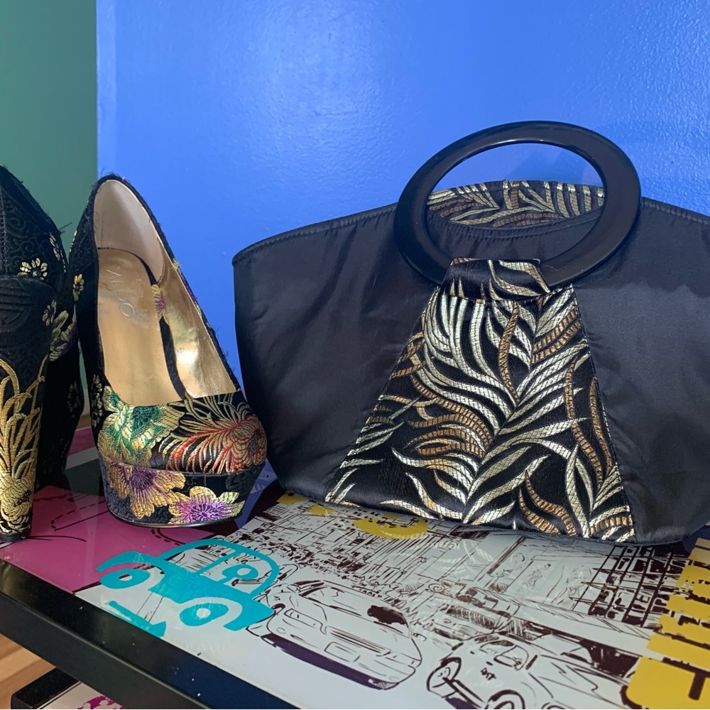 Elegant Black and Gold Tote with Matching Wedge Pumps.